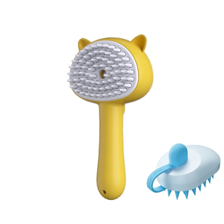 Yellow pet grooming brush with cat-ear details and a white bristle pad, shown alongside a smaller blue-and-white alternative brush on a plain white background.
