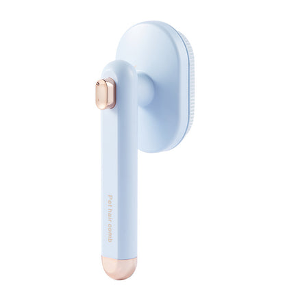 A light blue and rose gold manual hair detangling brush with a circular bristle head and a long handle, shown on a solid white background.