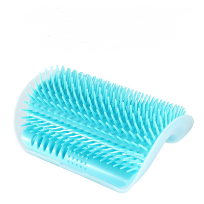 Blue pet grooming brush on a white background