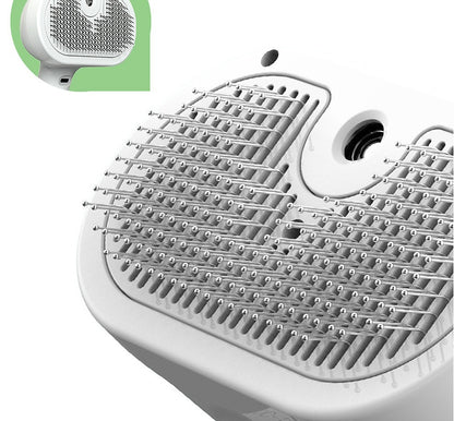 Close-up of a white electronic device with a green label on a white background