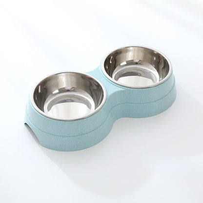 Pet bowl with two stainless steel compartments on a light blue base against a white background
