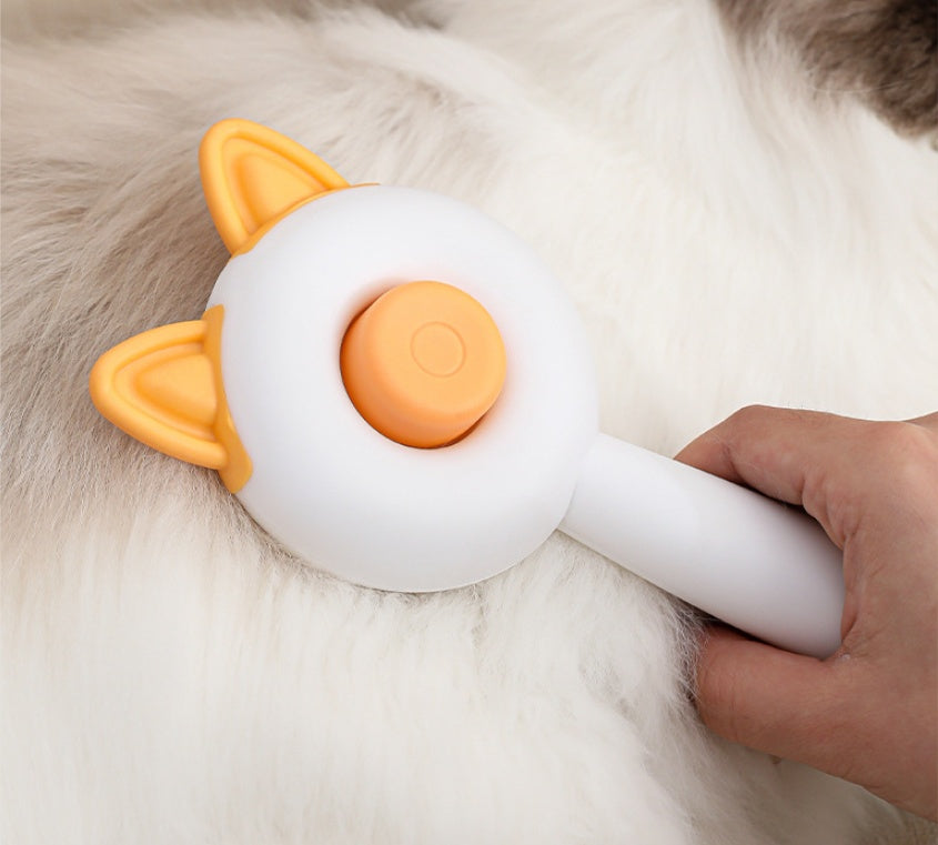 Pet grooming tool with cat ears being used on a white cat
