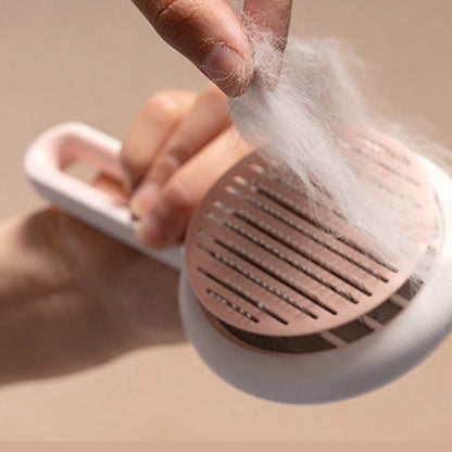 Pet hair removal tool with pet hair being pulled out