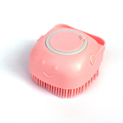 Pink pet grooming brush with a smiley face on a white background
