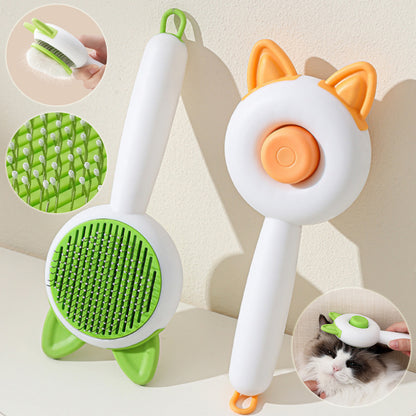 Pet grooming brush with green bristles and orange accents on a neutral background