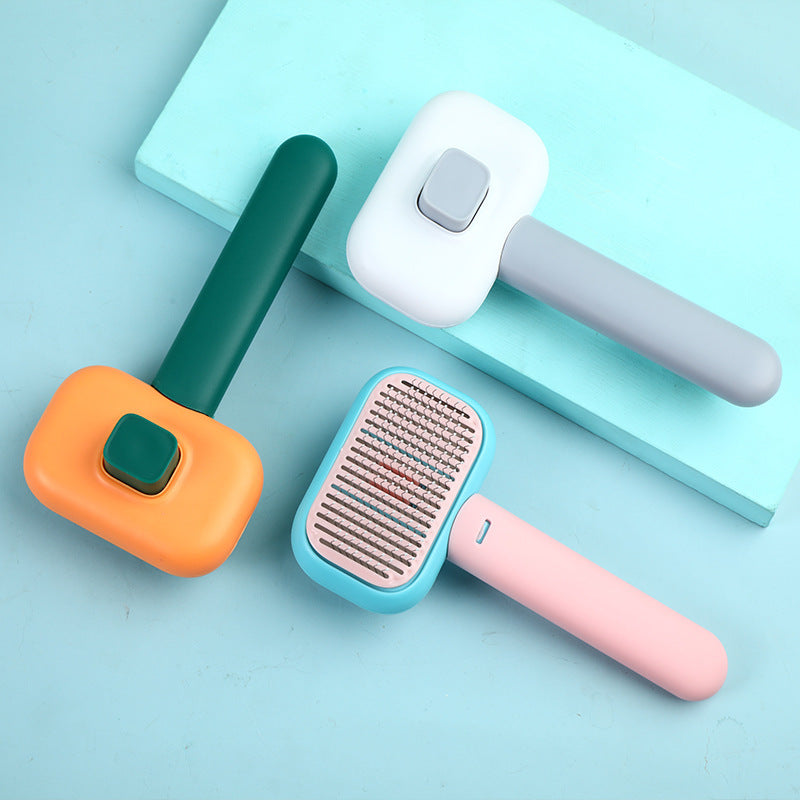 Set of colorful pet grooming tools on a light blue background