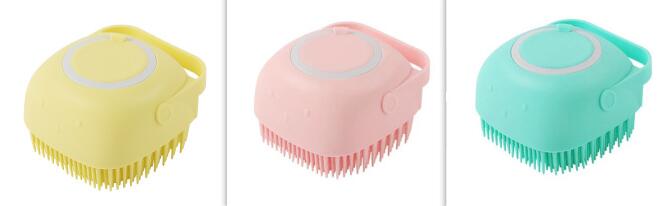 Three colorful silicone scrubbers in yellow, pink, and green on a white background