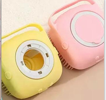 Two small electronic devices, one yellow and one pink, on a light beige background.