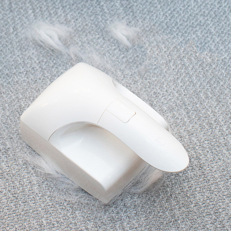 White electronic device on a textured gray surface