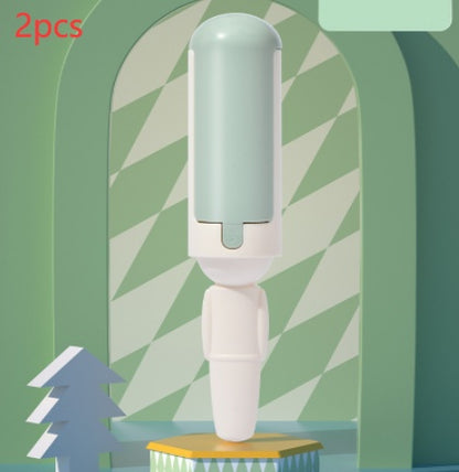 Two white and light blue dispensers on a green and white abstract background
