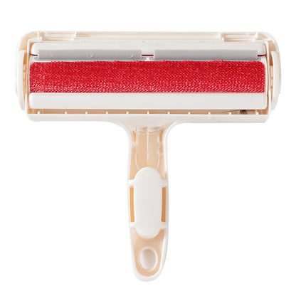 Red roller brush with beige handle on a white background