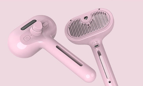 Pink handheld device with a digital display on a light pink background