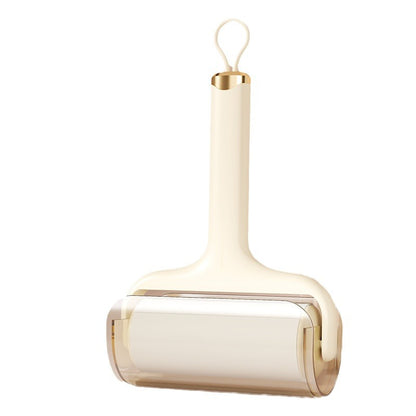 Sticky lint roller quickly removes dog and cat hair from clothes, furniture, and upholstery with strong adhesive sheets.