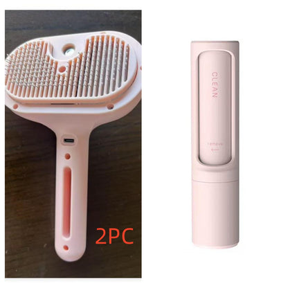Pink pet grooming brush with cleaning module on a white background