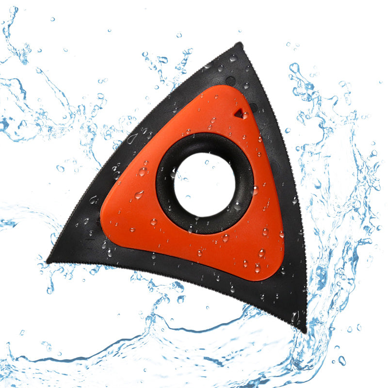Triangular blade with orange center and black sides on a water splash background