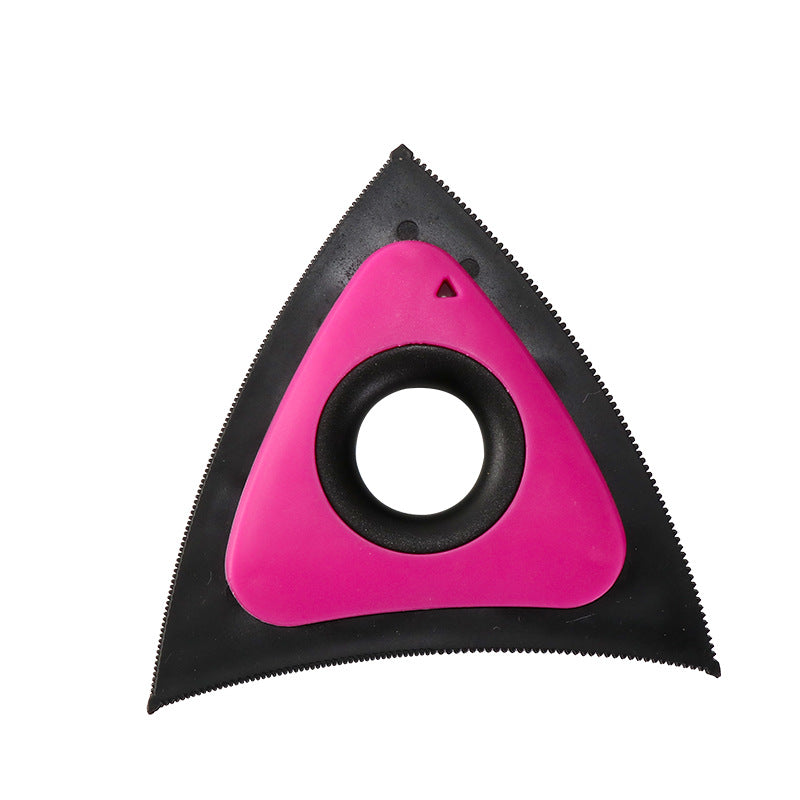 Triangular tool with pink center and black edges on a white background